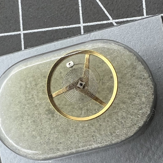 Swiss Balance Wheel for ETA C01.211 movement, precision watch part #6402 by Swiss Balance Wheel, ensuring accurate timekeeping.