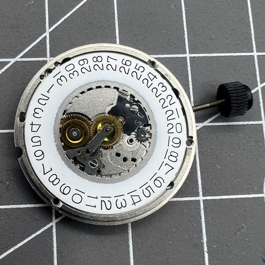 ETA 555.415 quartz watch movement with 3 hands and date at 3 o'clock, vintage original part.