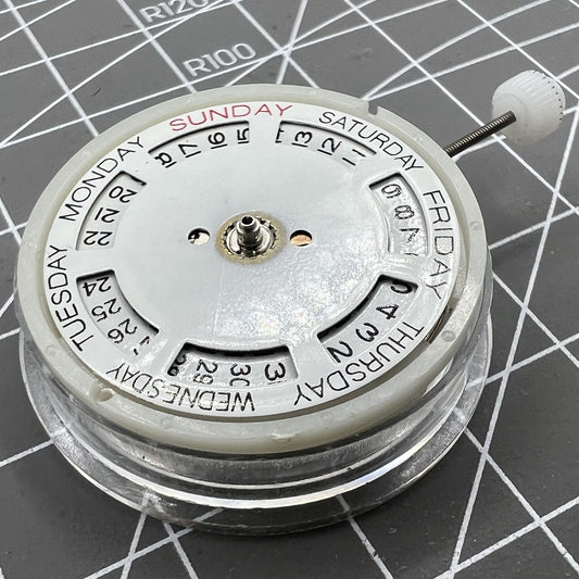 Silver DG2813 automatic watch movement with day-date function, precise replacement for mechanical watches.