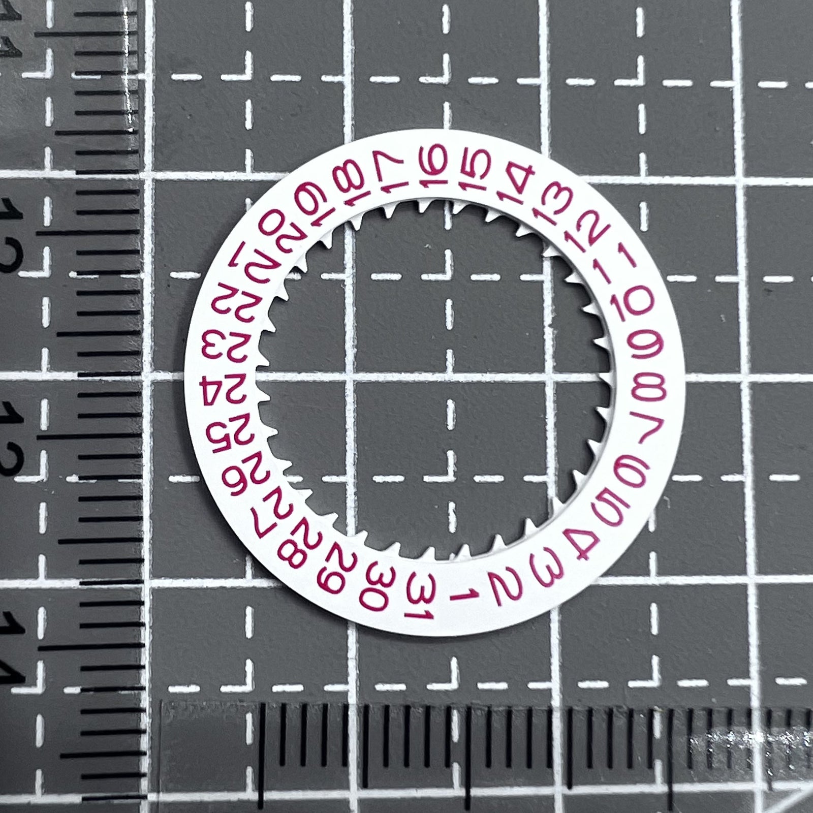 Red character date wheel for Seiko NH35 NH36 watch movement, date display at 3 o'clock.