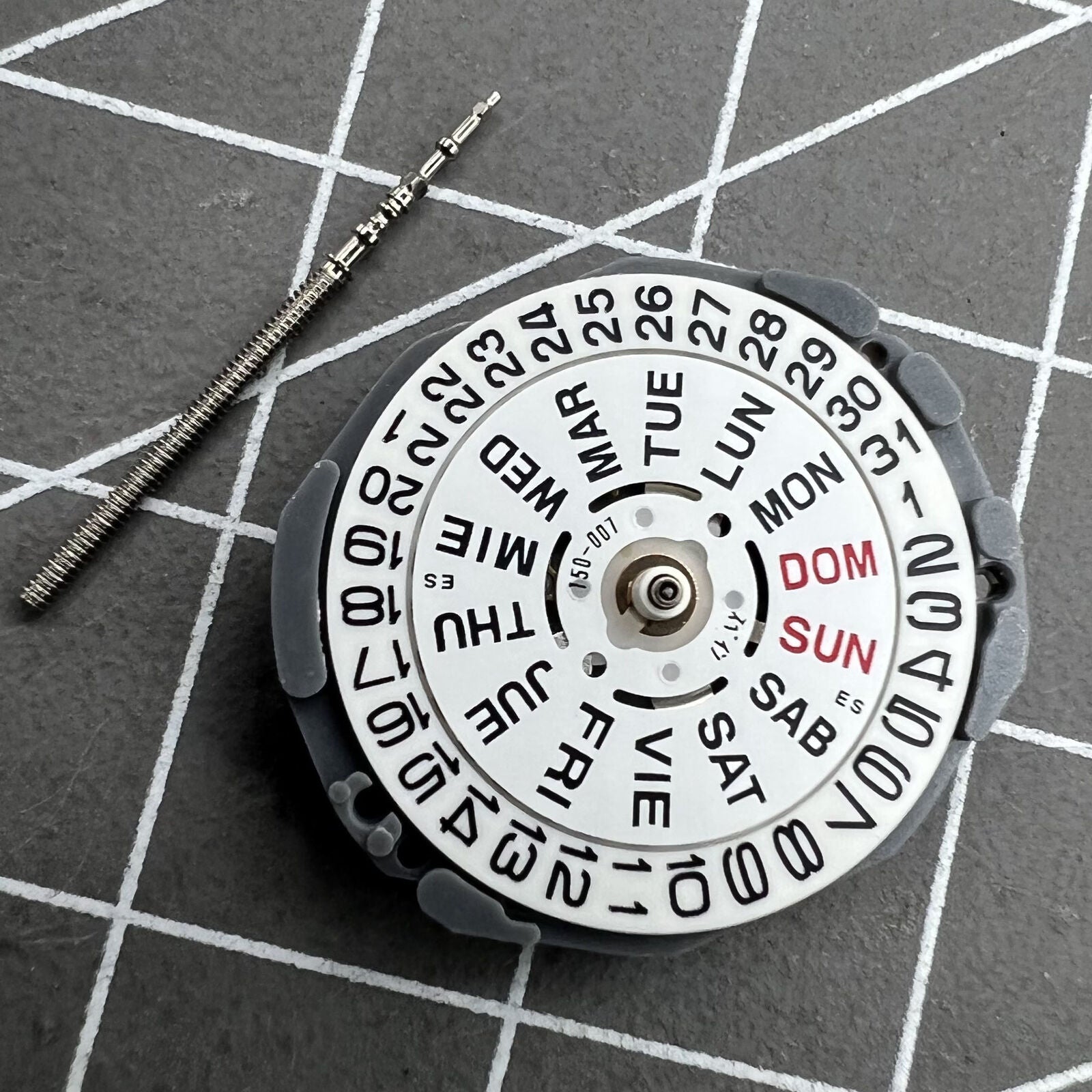 Hattori Epson VJ23 watch quartz movement for precise timekeeping in watch accessories.