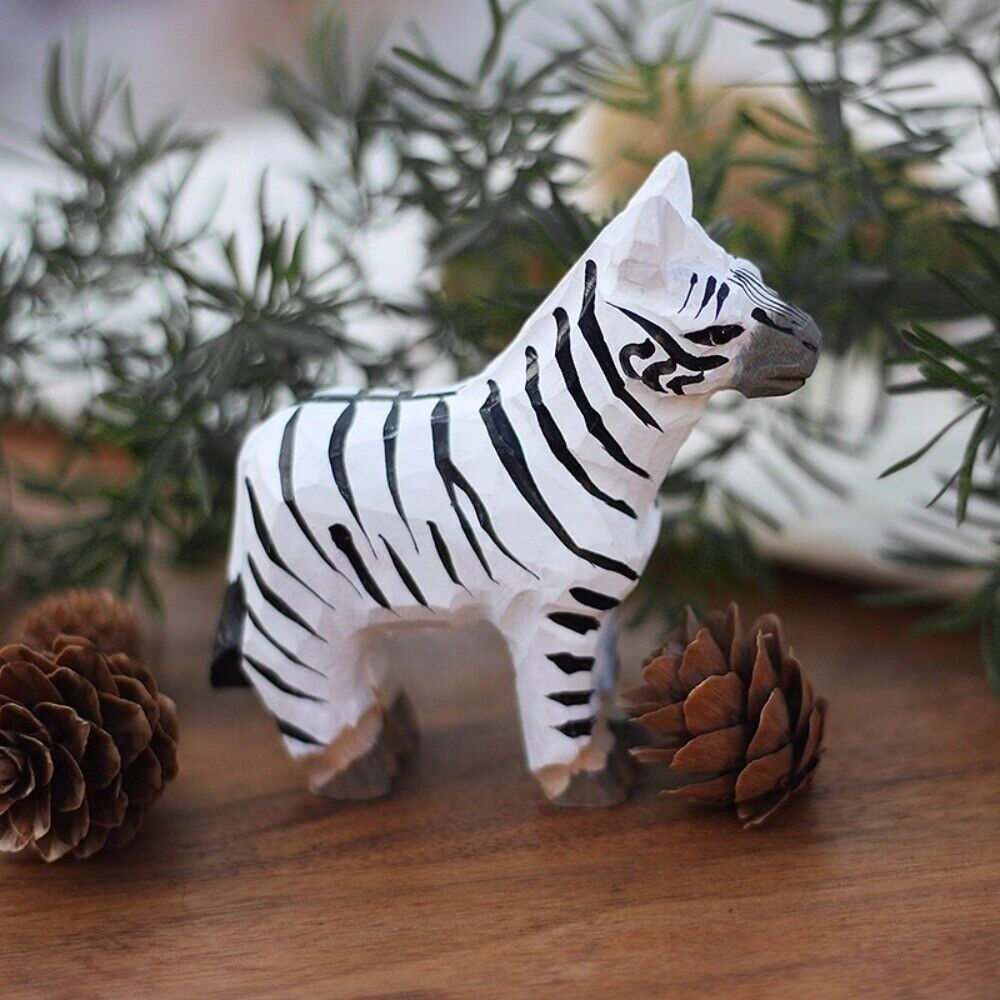 Handmade Little Zebra wooden figurine, detailed decorative sculpture for home or office display.