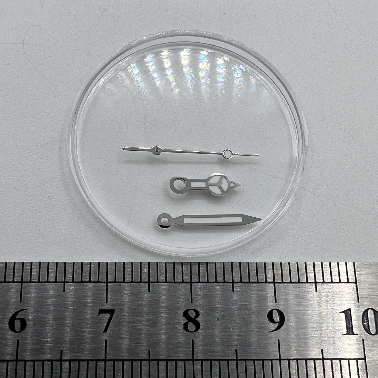 Green luminous watch hands with silver trim, 12mm size, for Miyota NH35/NH36/NH38 movements.