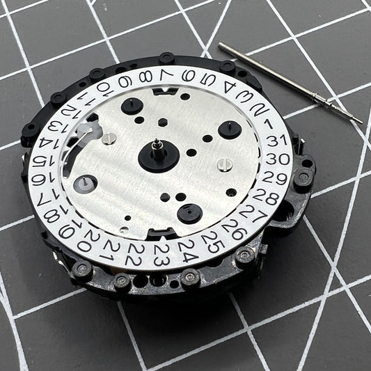 Hattori Epson TMI VD53 quartz watch movement with date function at 3, 6, and 4:30 positions, Japan made.