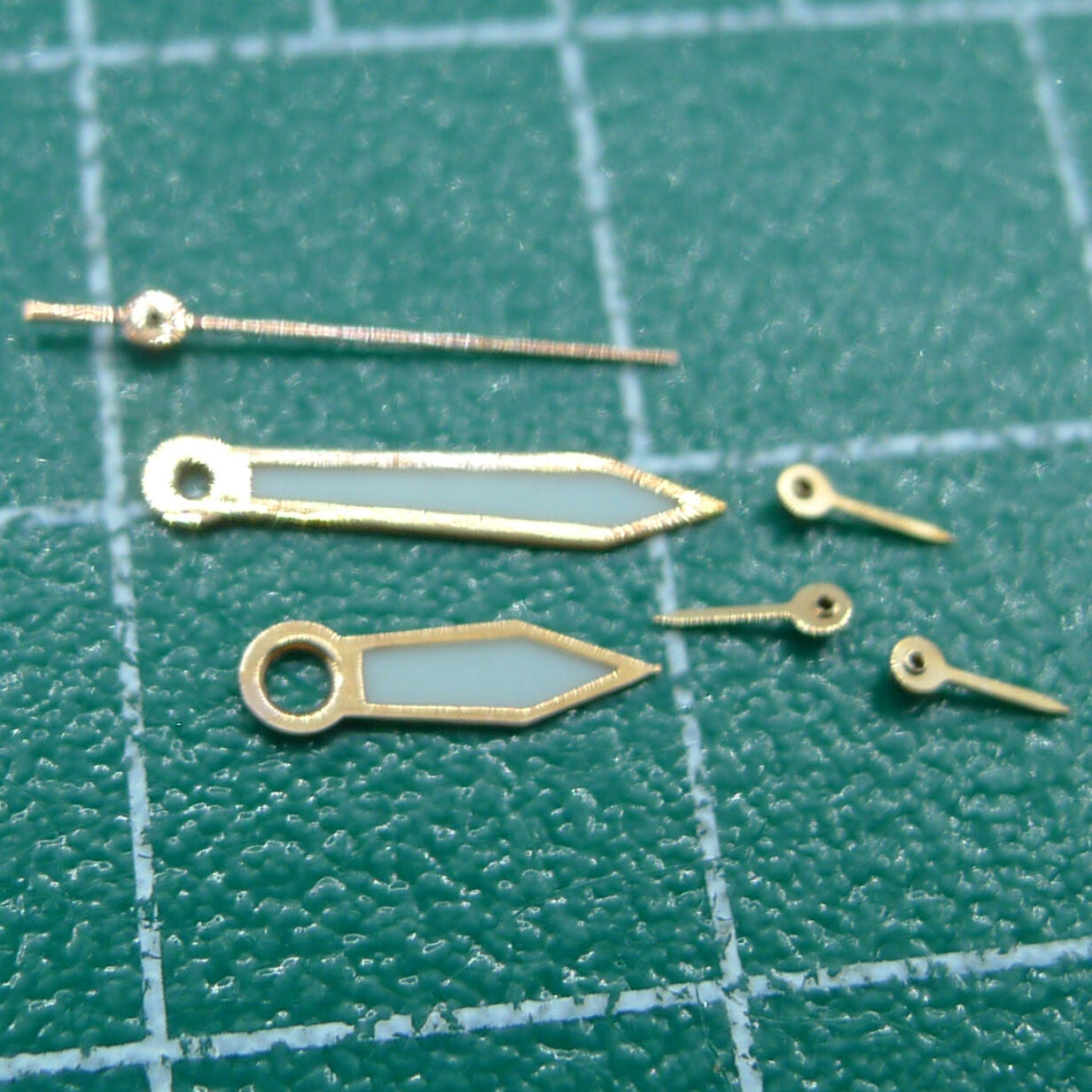 Set of 10 luminous 10mm watch hands for Miyota OS series, ideal for accurate timepiece repair.