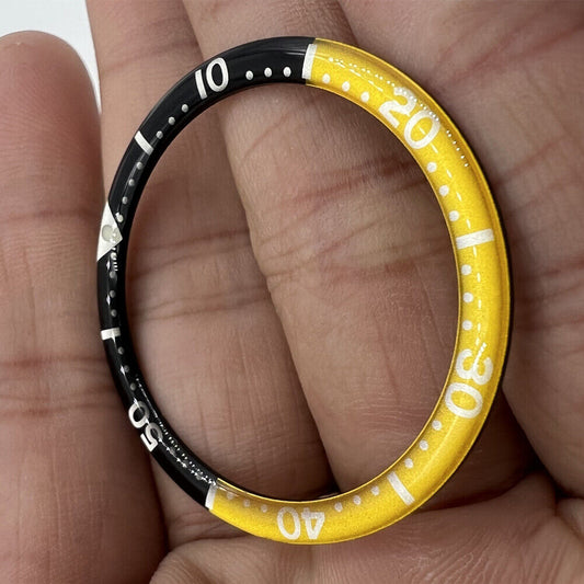 Black and yellow circular arc bevel aluminum watch bezel insert for 39mm wristwatches, enhancing style and durability.