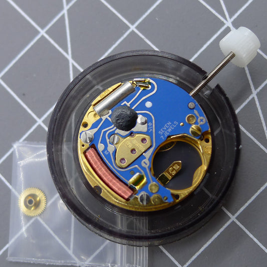 Swiss Made ETA 956.112 quartz watch movement with 3 hands and date display at 6 o'clock.