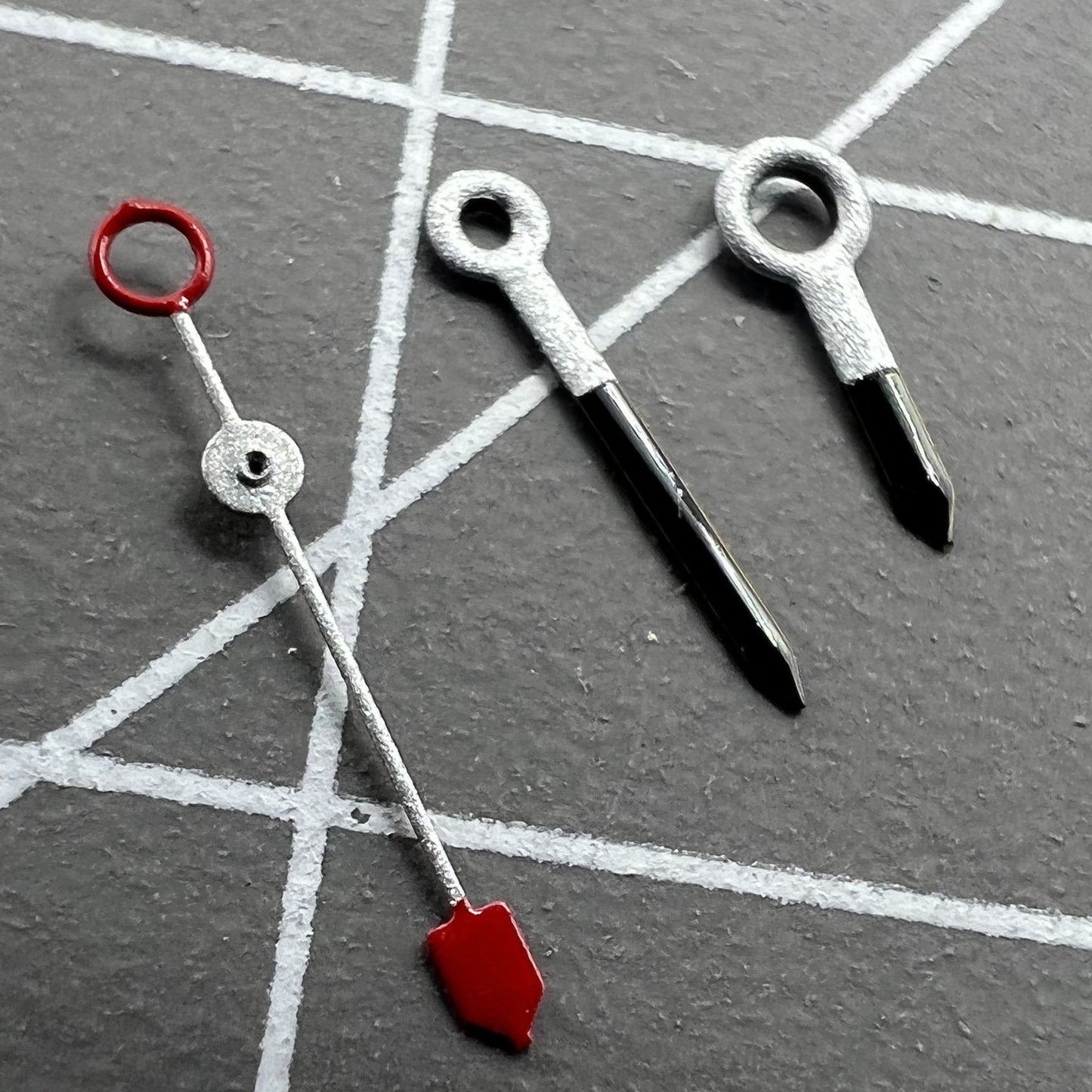 Silver and black watch hands, compatible with Miyota 2035, 2115, 2105, 2305, 2315 movements, precise fit for repairs.