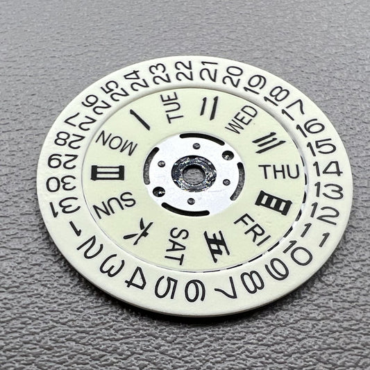 White date and week disk wheels with green lume for Seiko NH36 movement, enhancing watch accessory visibility.