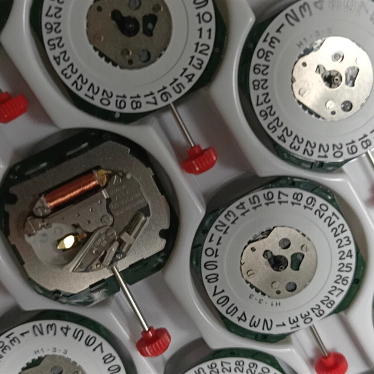 Japan Miyota 2317 quartz watch movement with date display at 3, silver repair part for precision timepieces.