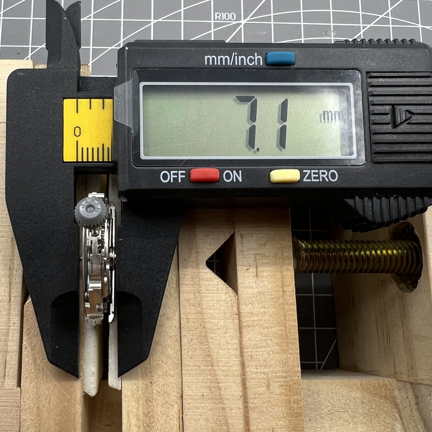 Miyota/Citizen 8215 automatic watch movement with black dial, date at 6, precision mechanical accessory.