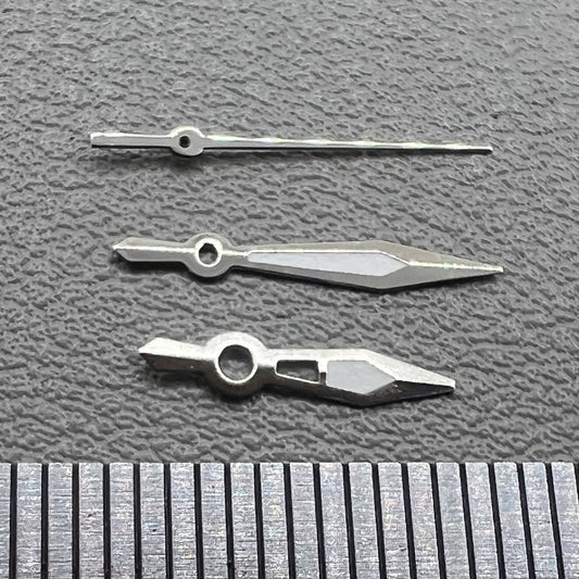 Silver-trimmed green lume arrow hands set for Ronda 515 watch movement. Perfect for upgrades.