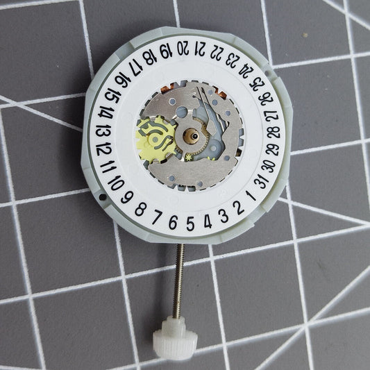 Sunon PE28 quartz watch movement with 3 hands and date display at 6 o'clock, reliable timekeeping.