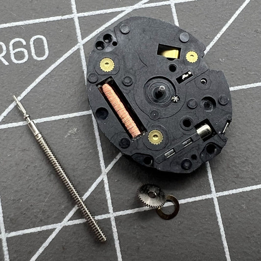 Epson TMI VX10A quartz watch movement with 2 hands, precise timekeeping for watch repair.