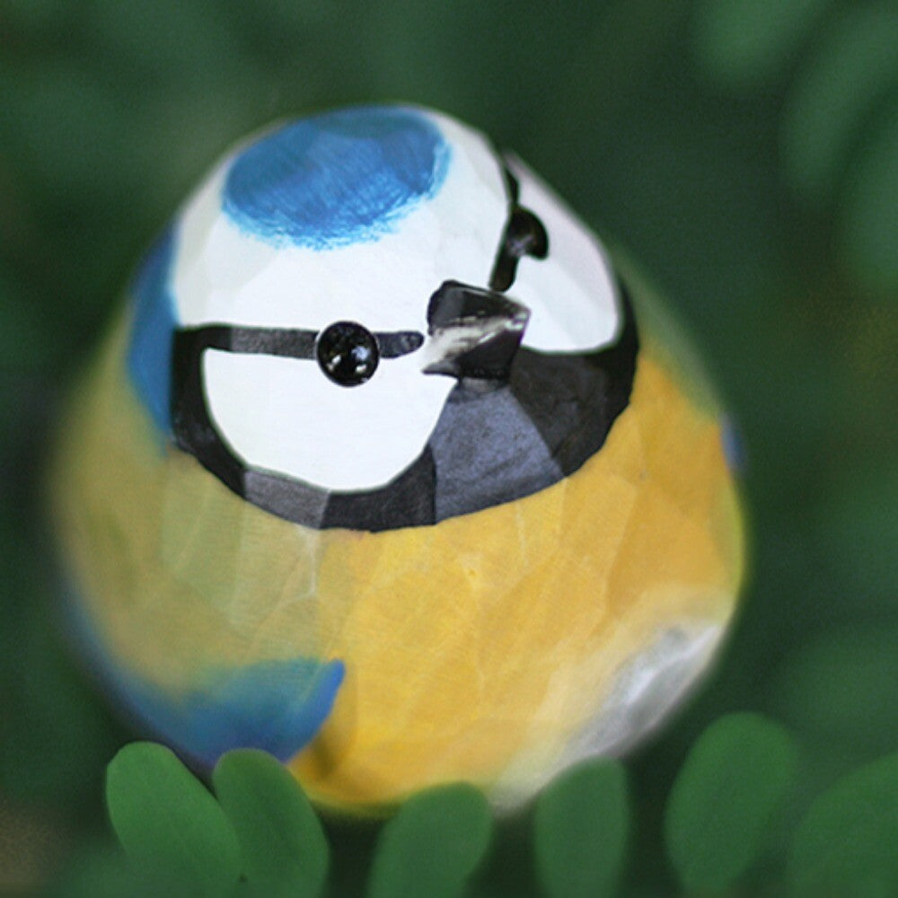 Handcrafted Blue Tit wooden figurine, perfect for rustic watch accessory display and elegant decor.