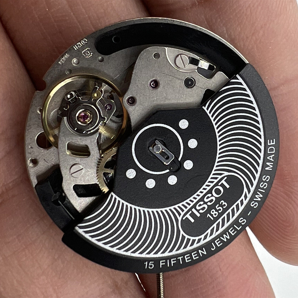 ETA C01.211 chronograph mechanical watch movement with 1853 black dial by Tissot for precise timekeeping.