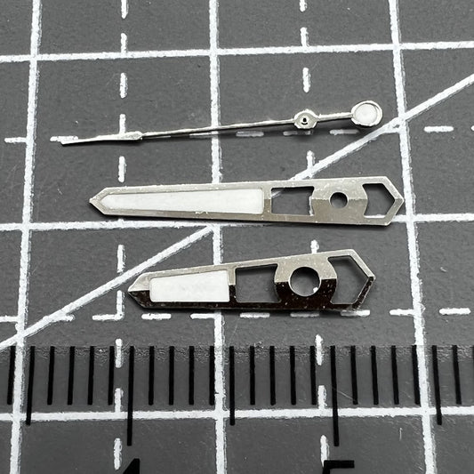 Silver 13mm hollow watch hands with blue lume for Seiko NH35 NH36 movements, enhancing readability and style.