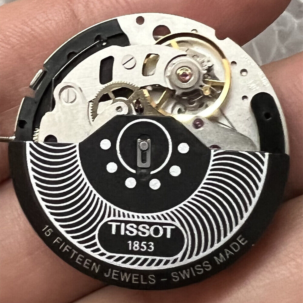 Swiss Made ETA C01.211 chronograph watch movement with black dial, precision mechanical component by Tissot 1853.