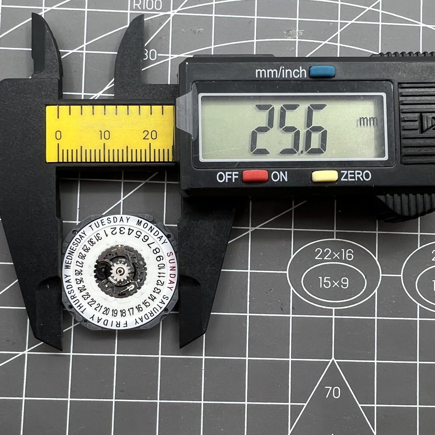 Hattori Epson TMI VJ55 quartz watch movement with date at 6, precision Japan-made component for watch repair.