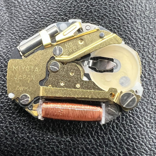 Miyota SUPER 2035 quartz watch movement close-up highlighting Japan-made precision engineering.