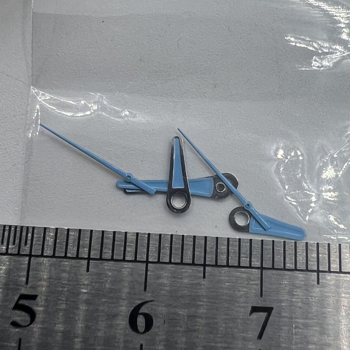 Set of blue 13mm, 11mm, and 9mm watch hands for Miyota 2035 movement, sleek style.
