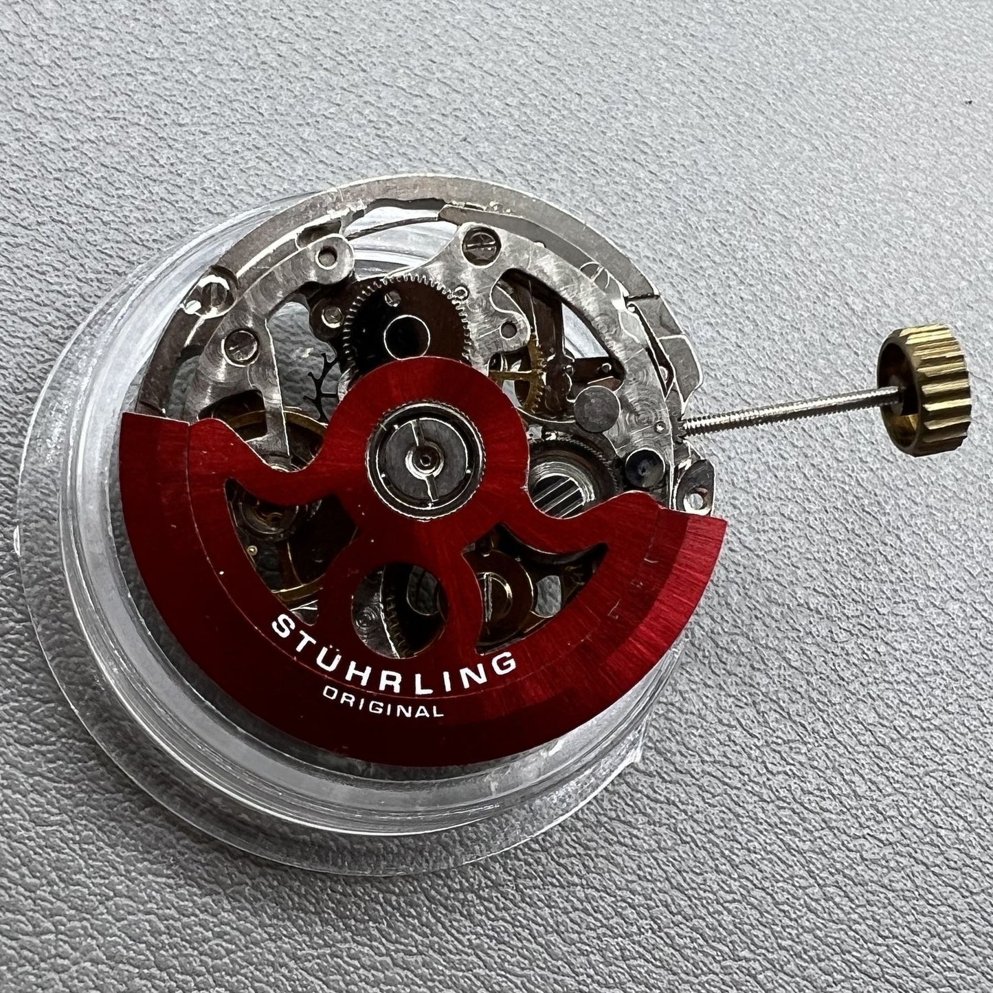 Hollow Hangzhou 2189 watch accessory featuring red rotor and automatic mechanical movement for precision timekeeping.