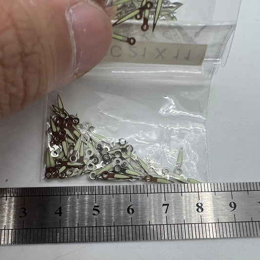 Set of 11mm silver lume watch hands for Epson PC21 quartz movement, enhancing readability and style.