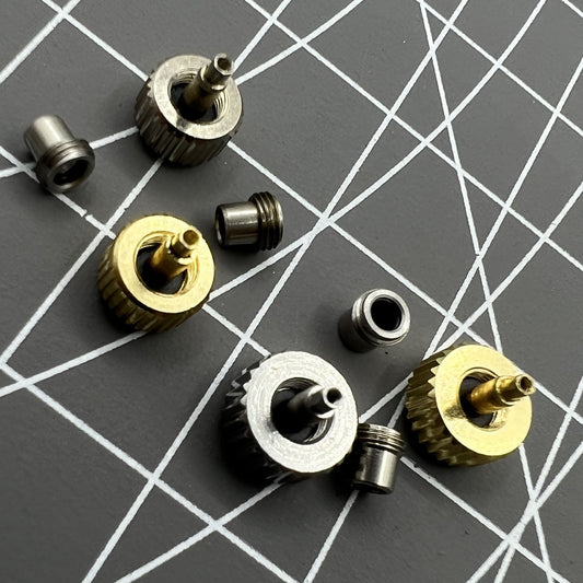 Silver and gold stainless steel screw-on watch crown with tube and gasket, durable replacement.