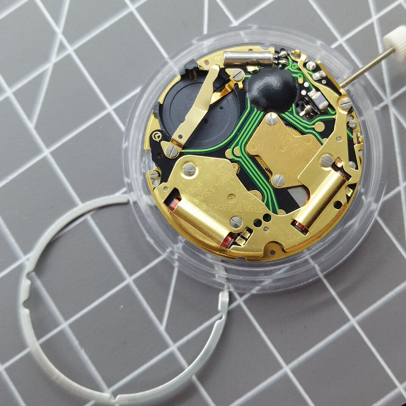 Swiss Made ISA 8171 watch movement with quartz date at 6 o'clock, multifunctional precision for watch repairs.