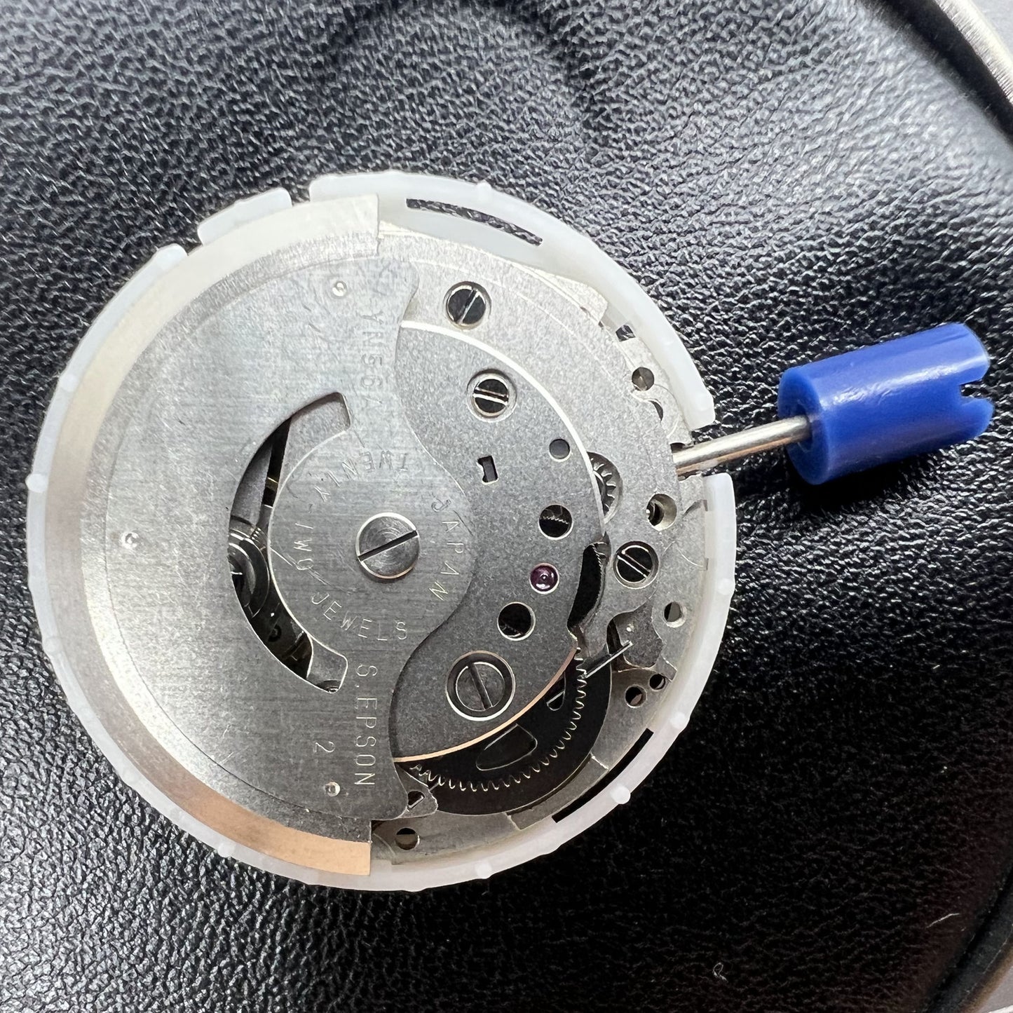 Japan Epson YN56 mechanical watch movement with date and day display for precise watch repair.