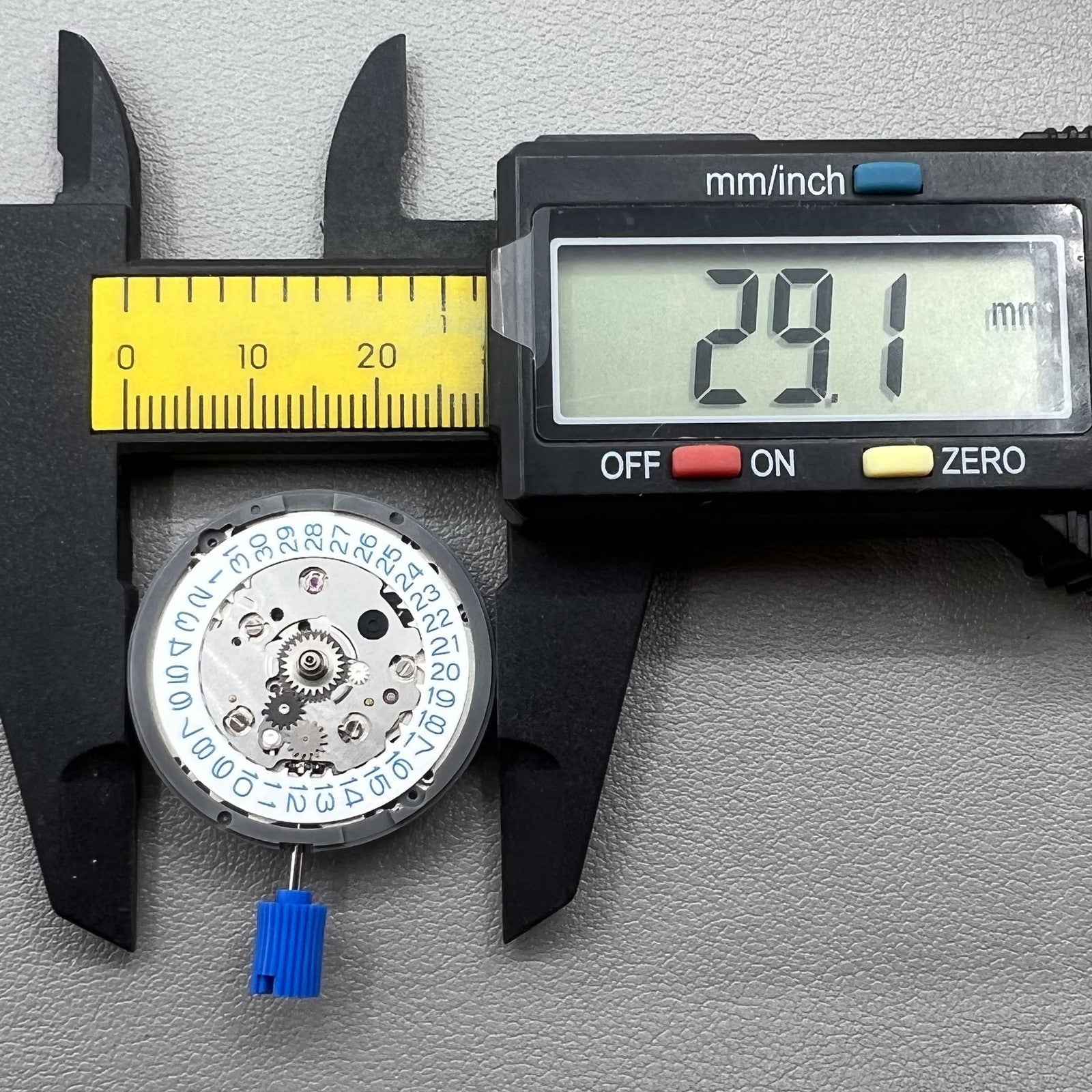 Seiko NH34 automatic GMT watch movement showcasing hacking seconds for precise timekeeping.