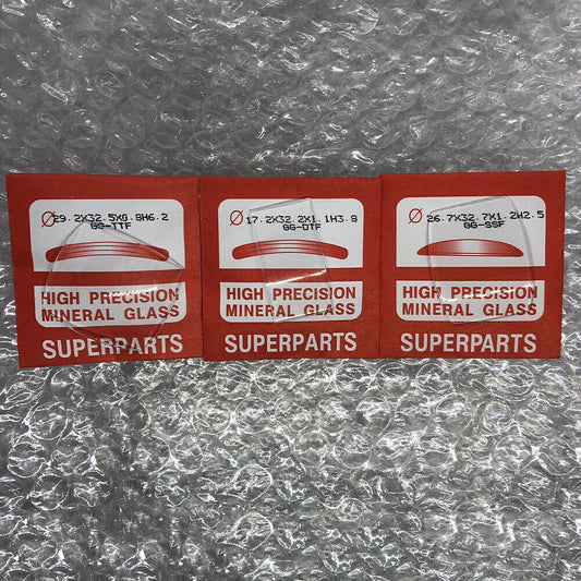 1. KG-684.33-ASF watch crystals kit with 33 sapphire glass sizes for precise watch repairs by KG.