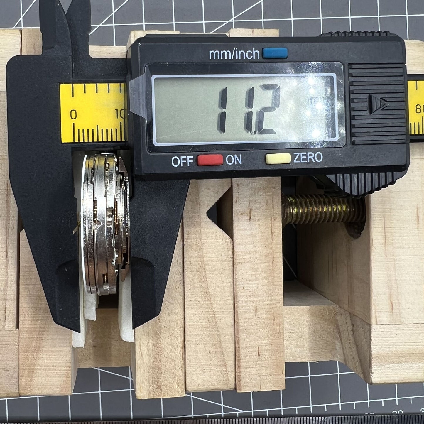 Automatic chronograph watch with ETA 7750, black dial, calendar at 4:30, and precision timing.