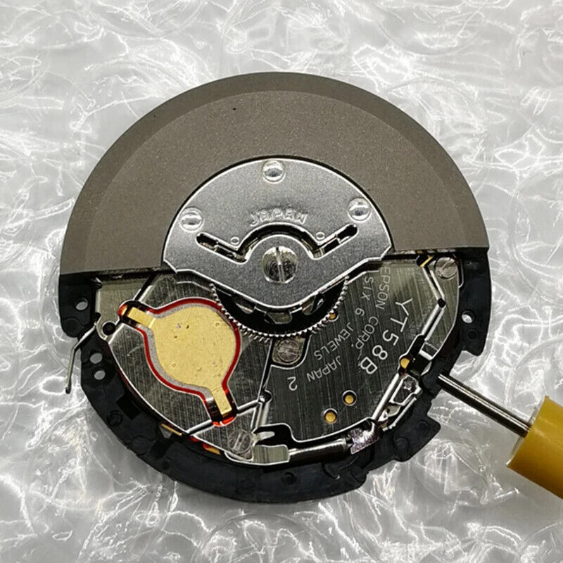 Hattori Epson TMI YT58B quartz watch movement, precision Japan-made component for watch repair.