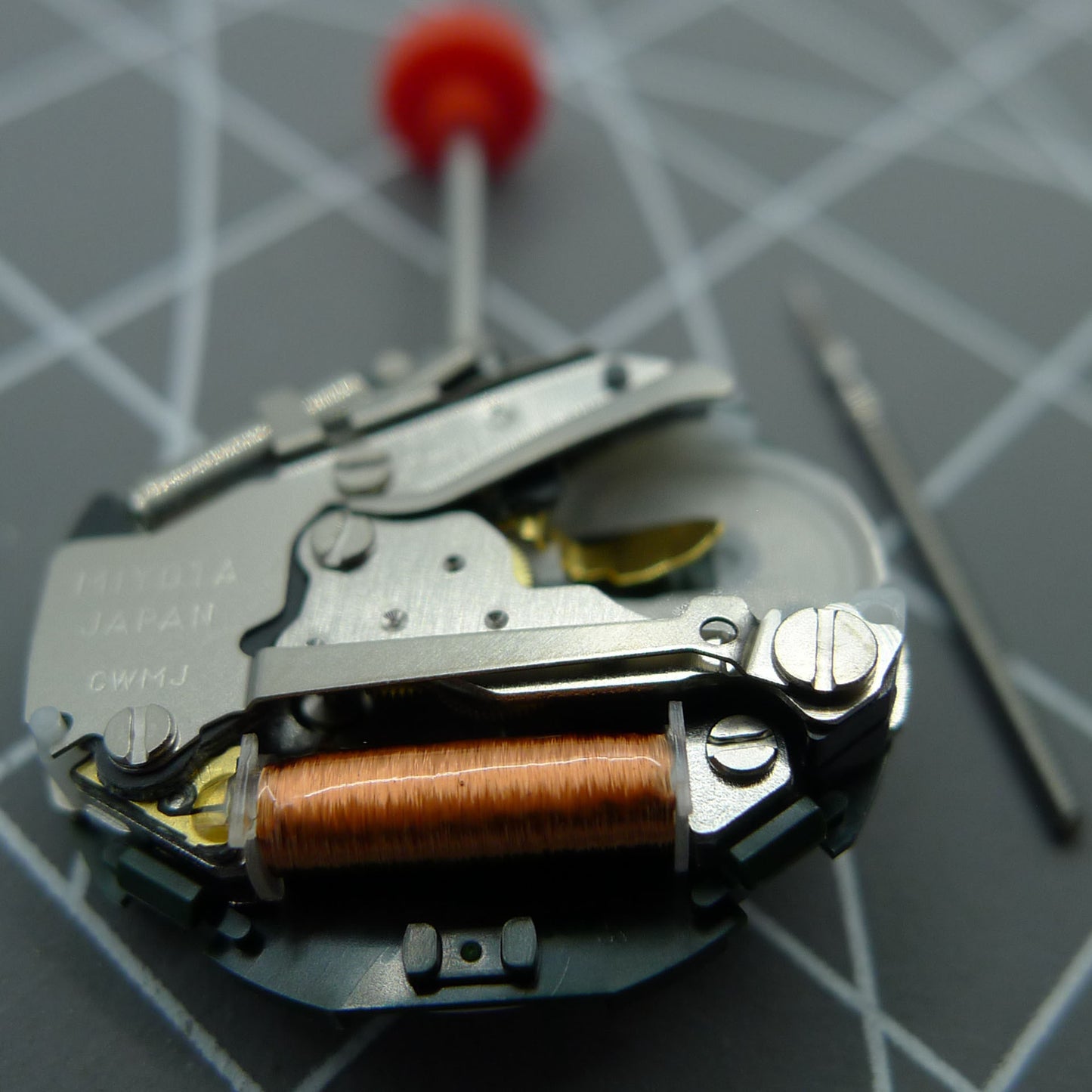 Japan-made Miyota/Citizen 2005 quartz watch movement with day-date function and precise time setting stem.