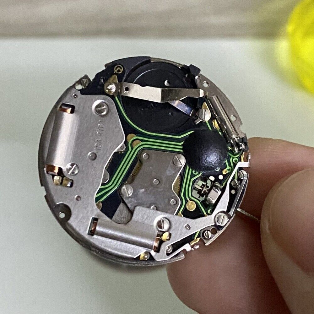 Swiss Silver ISA8171 watch featuring ISA 8161 quartz, date at 6, black dial, and six-hand display.