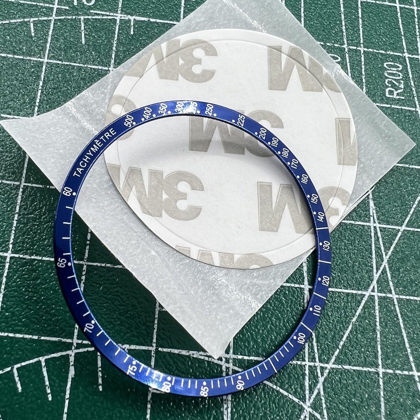 Großhandel Aluminiumlegierung Blauer Ring Weiße Schrift Uhr Lünette für Omega Speedmaster