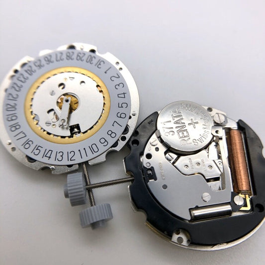 Ronda 705 quartz watch movement with date display at 3 o'clock, precision watch repair part.