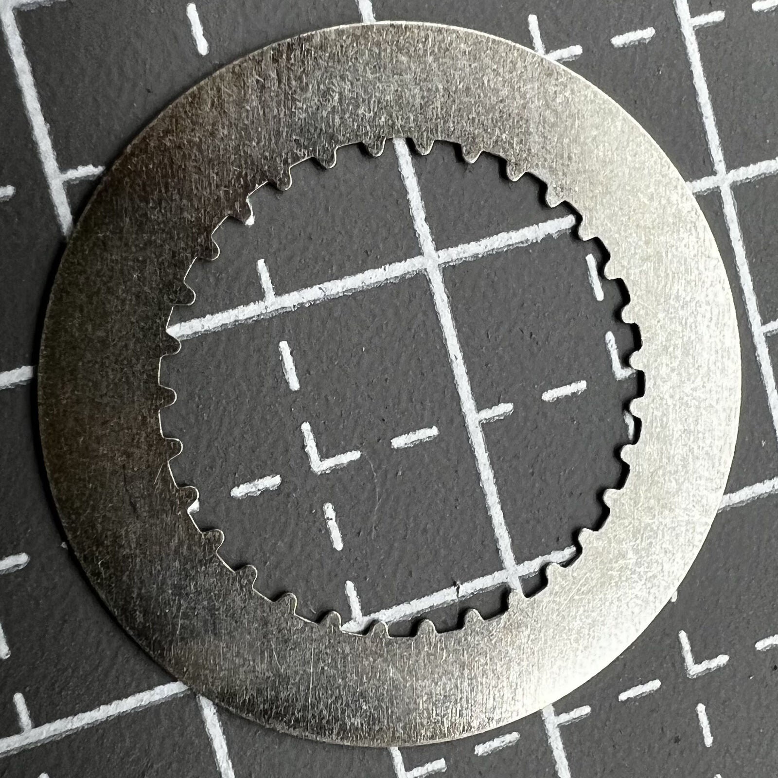 Golden vintage numeral date disk wheel for RLX3135 watch movement by RLX, enhancing classic timepiece aesthetics.