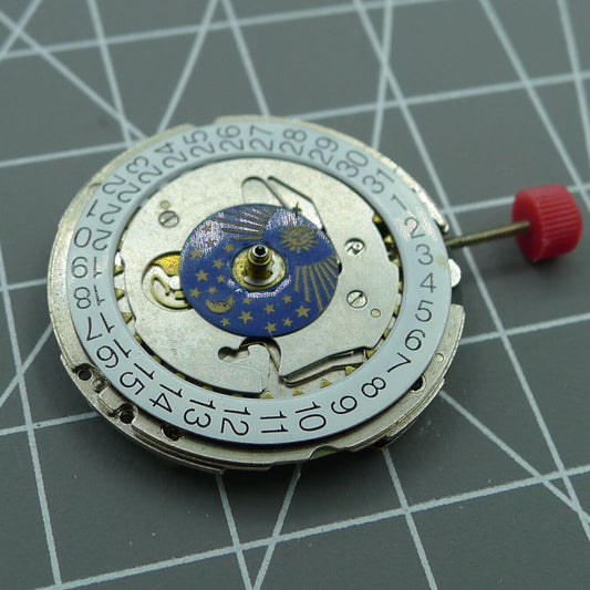 ISA 1198 Quartz watch movement with Swiss precision featuring moon and star phase indicators.