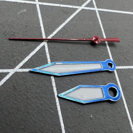 Blue and red trim green lume watch hands set for Ronda 515 movement, 2 sets per pack.