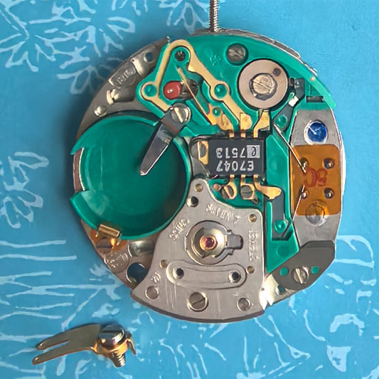 Swiss Made ESA9181 quartz watch part with silver finish, double calendar, and 3 hands for watch repair.