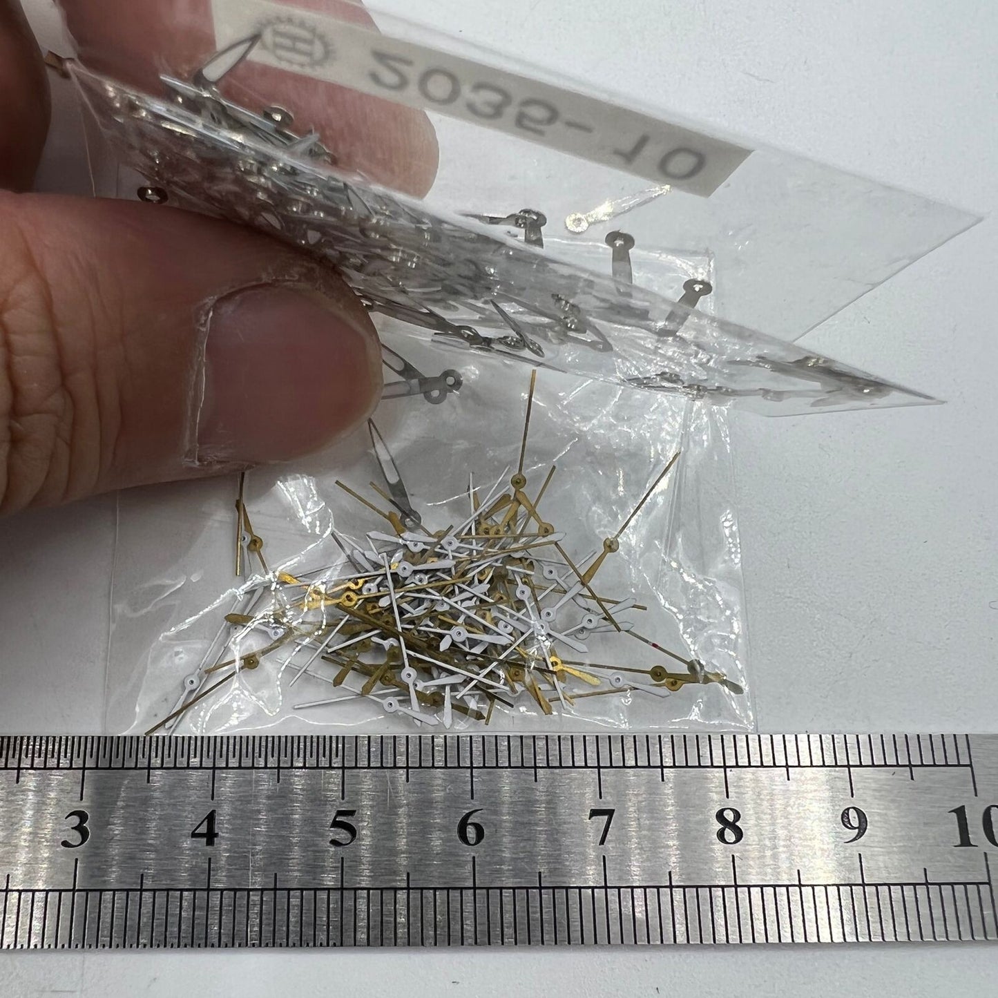 100 Sets 10 mm Uhrzeiger mit silbernem Rand und grüner Leuchtmasse für Miyota 2035 Quarzwerk