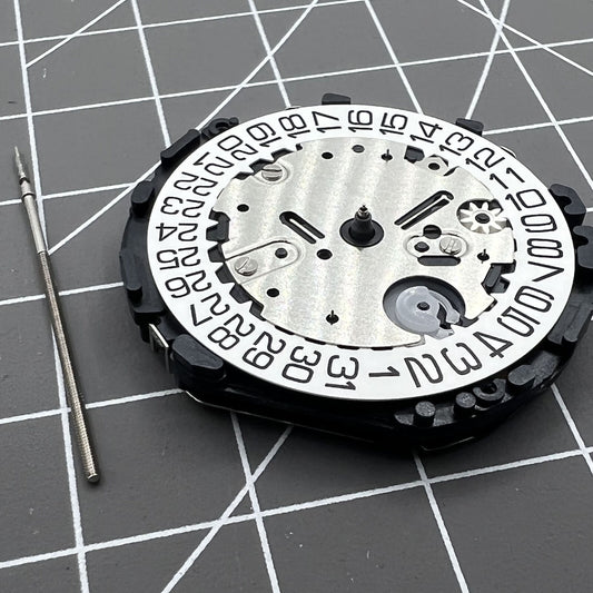 Hattori VR32 Japan quartz chronograph watch movement with precise timing for accessories.