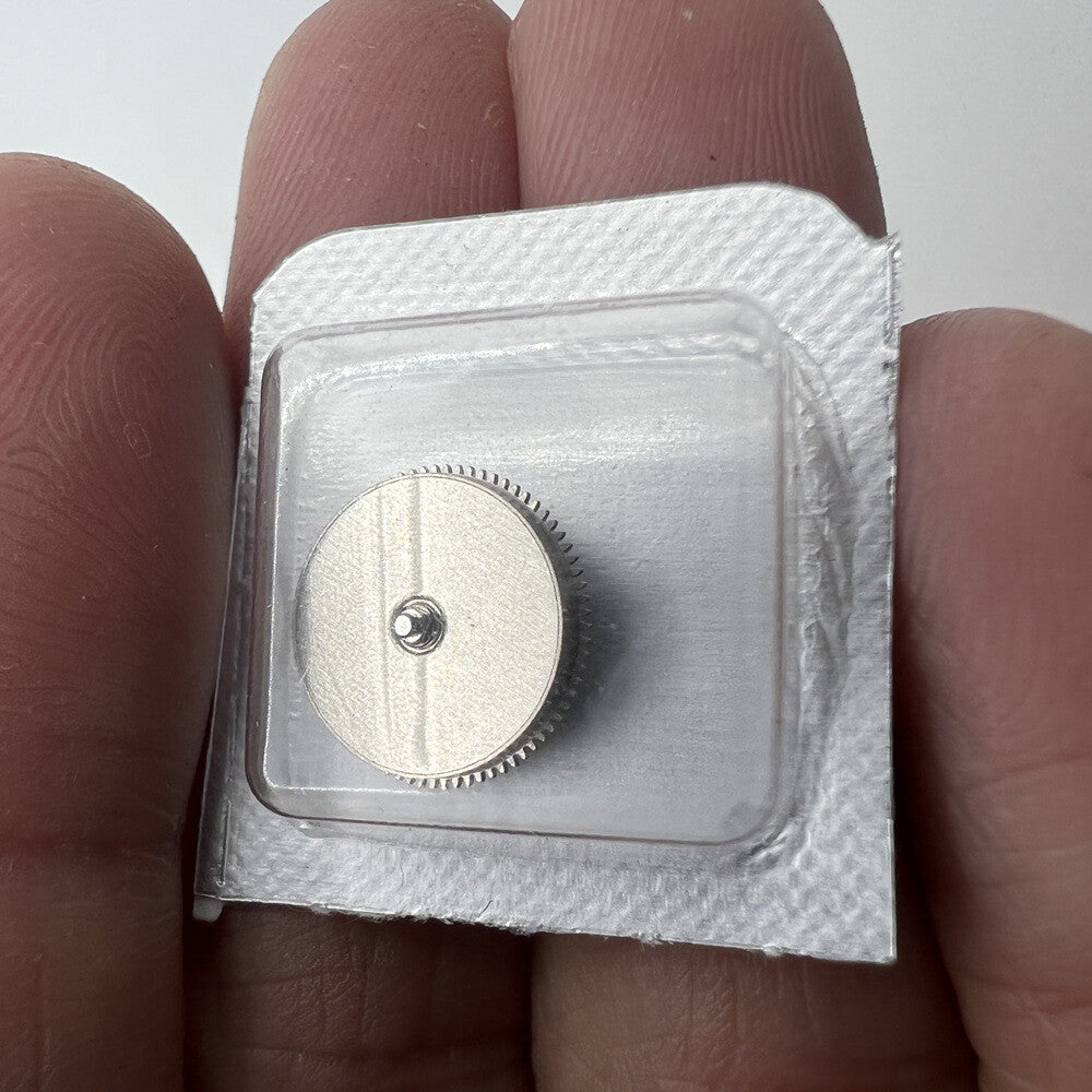 Silver barrel with complete mainspring for Miyota 8200 8215 watch movement, premium generic replacement, durable and precise.