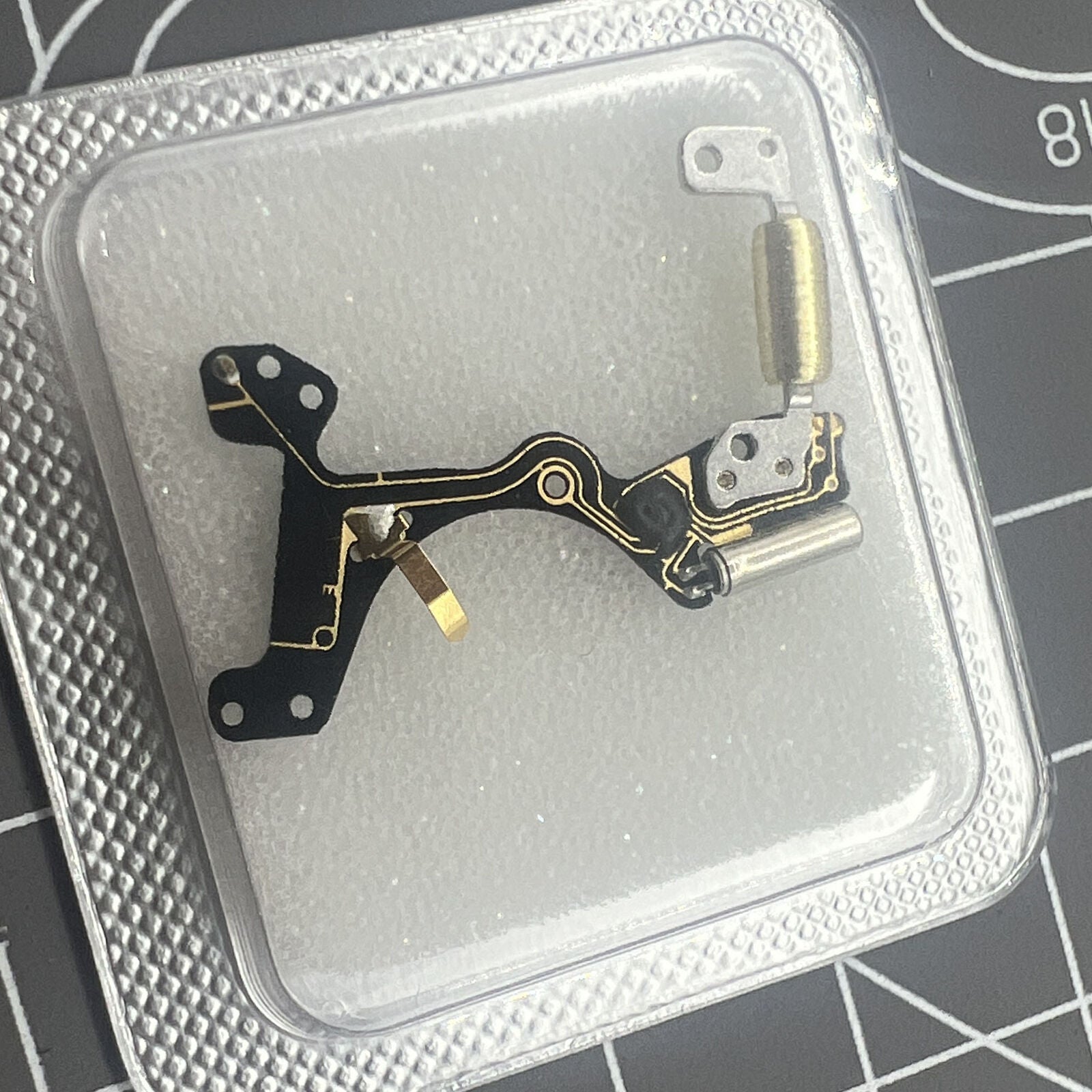 Circuit board for Ronda 7004.N watch movement, precision repair part for timepiece maintenance.
