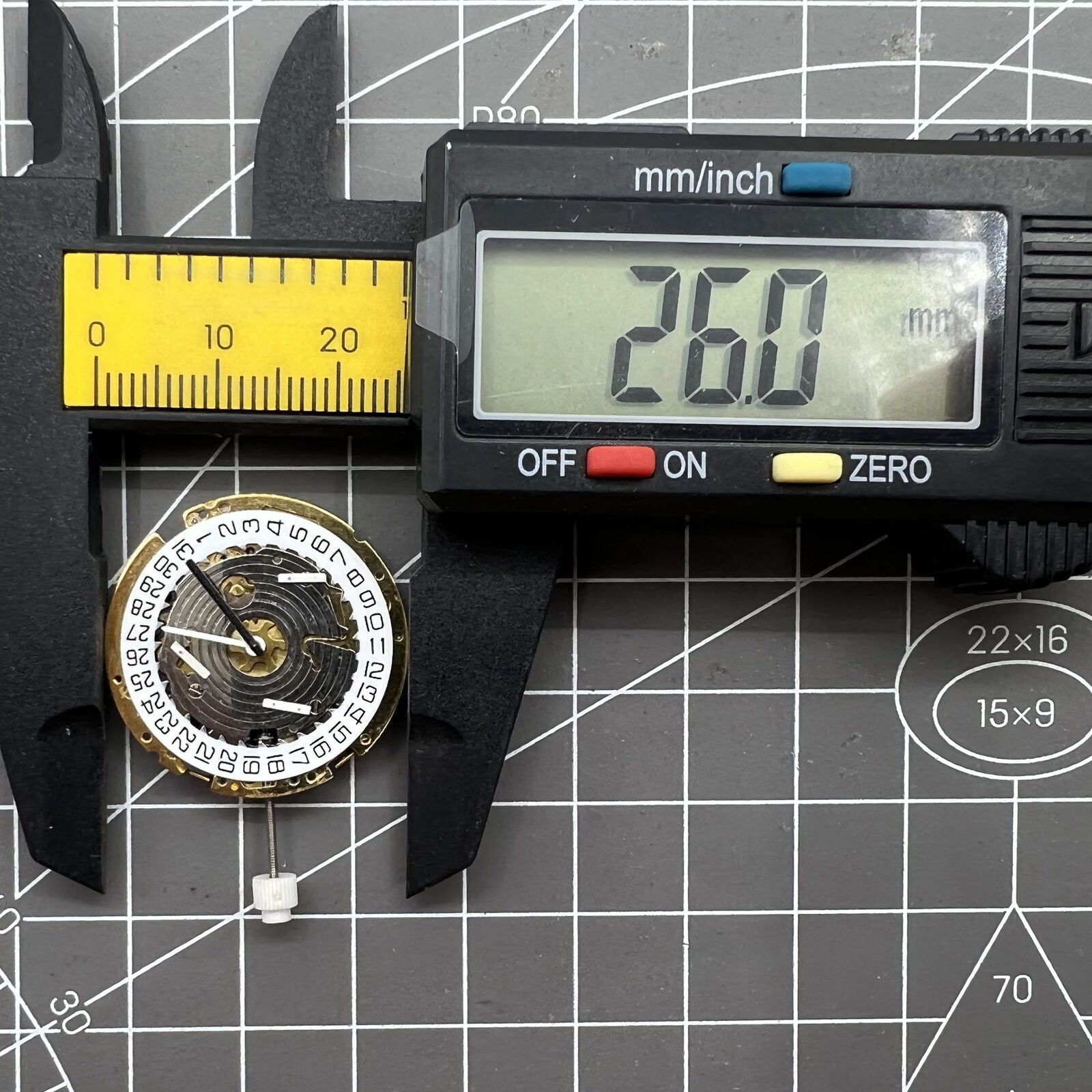 ISA 8171 Swiss quartz watch movement with date at 4, six hands on a white dial by ISA.