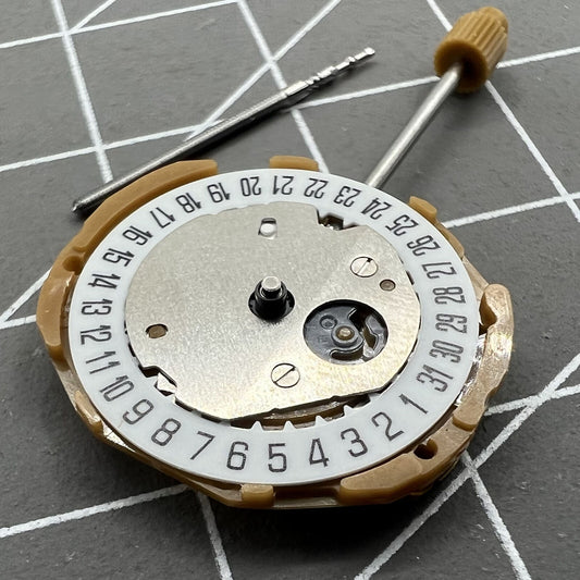 Miyota GL15 Japan Quartz watch movement showing date display at 6 o'clock position