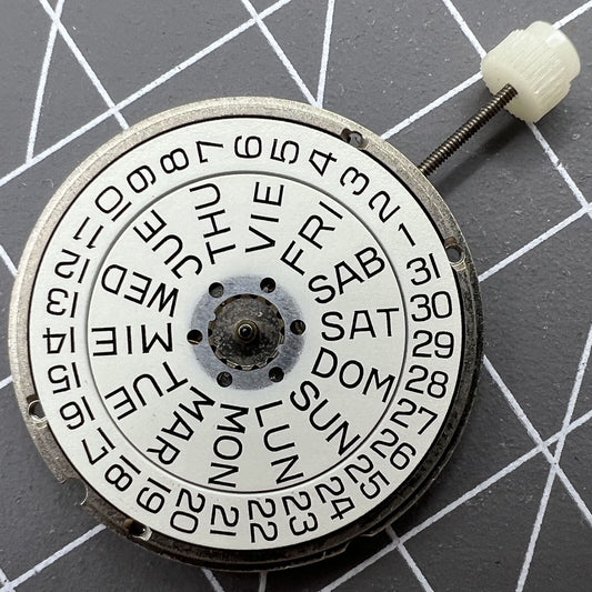 Swiss Made ETA 955.124 quartz movement with day-date function for precise watch repair.