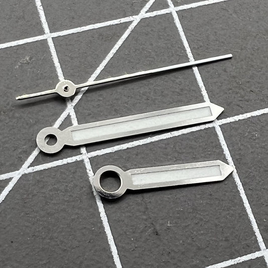 Set of 2 green luminous 17mm watch hands with silver trim for Miyota 2035, 2115, 2105, 2305 movements.